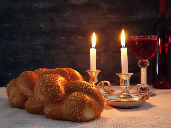 Shabbat candles and weekly Torah portion illustration